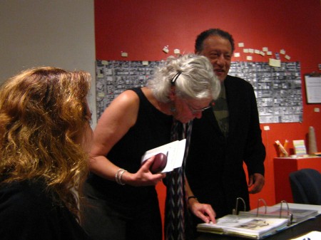 A binder with a collection of photographs and articles about Mission and Valencia Streets